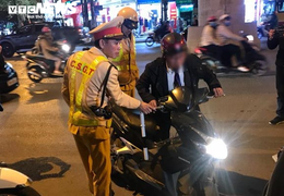 Lái xe máy vi phạm nồng độ cồn, xưng là vụ trưởng, dọa gọi Bộ trưởng giải quyết